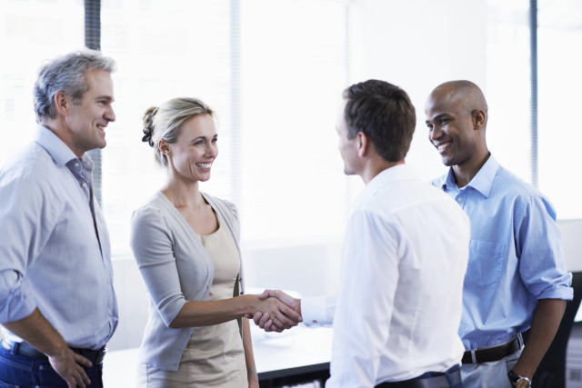 Group shaking hands