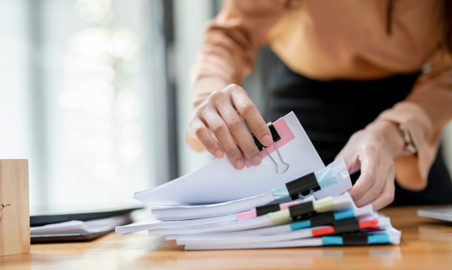 woman organizing papers